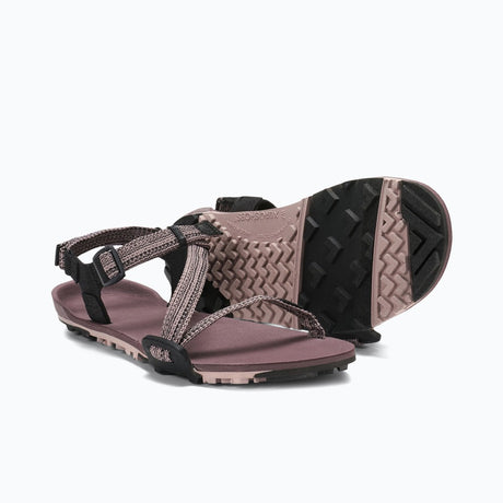 Pair of women's rose Xero Shoes Z-Trail EV minimalist sandals