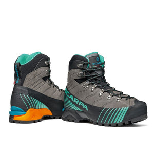 Angled view of women's scarpa ribelle hd mountaineering boots in titanium aqua colour
