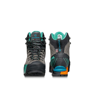 Front and back view of women's scarpa ribelle hd mountaineering boots in titanium aqua colour
