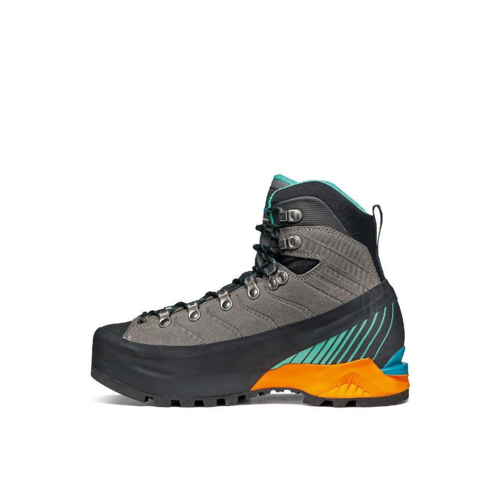 Inner side view of women's scarpa ribelle hd mountaineering boot in titanium aqua