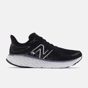 Side view of men's New Balance Fresh Foam X running shoe in black
