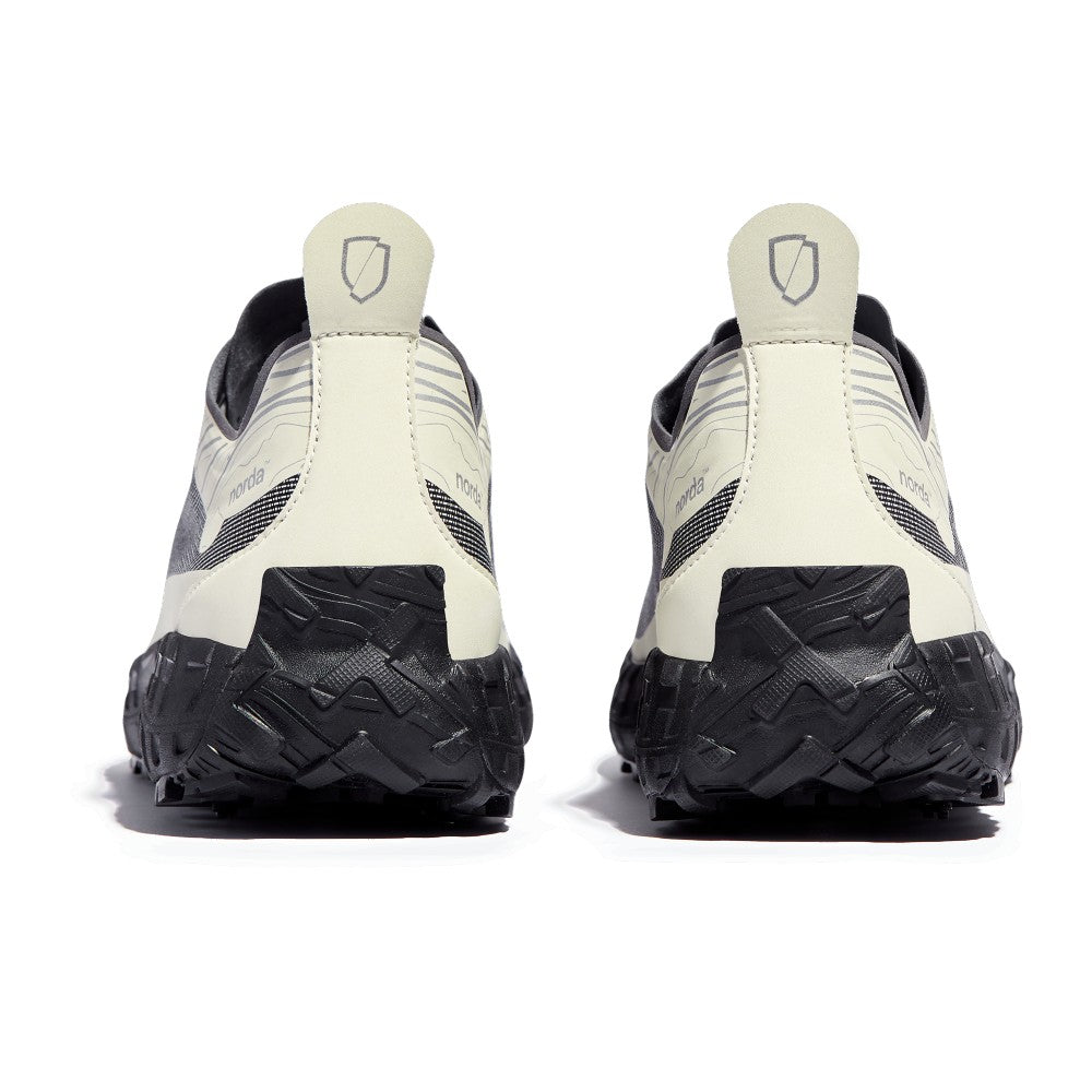 Heel view of women's norda 001 G+ Spike winter trail running shoes in bone colour