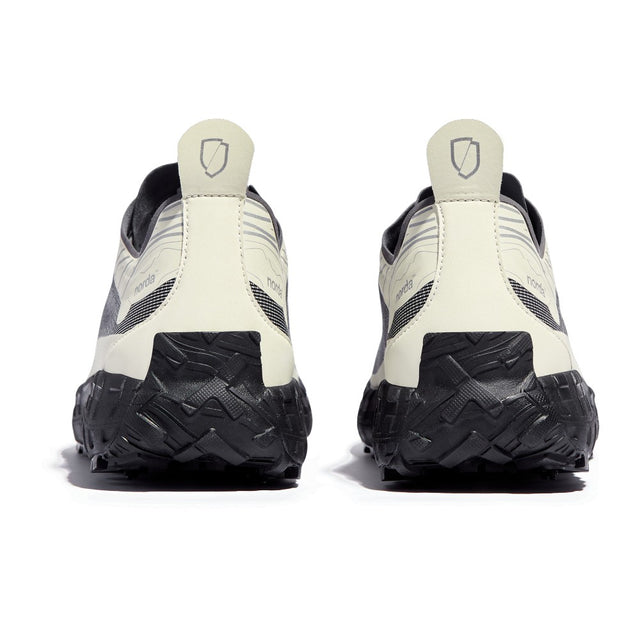 Heel view of women's norda 001 G+ Spike winter trail running shoes in bone colour