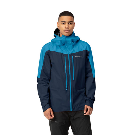 Front on-model view of men's blue norrona falketind Gore-Tex Paclite jacket