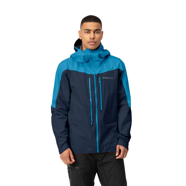 Front on-model view of men's blue norrona falketind Gore-Tex Paclite jacket