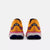 Heel view of women's New Balance Fresh Foam X running shoe in Apricot